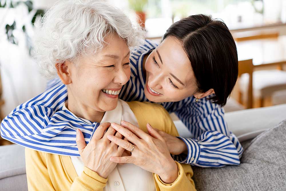 daughter and mother hugging each other